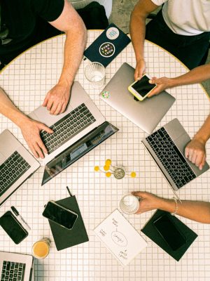 photo of people using laptop